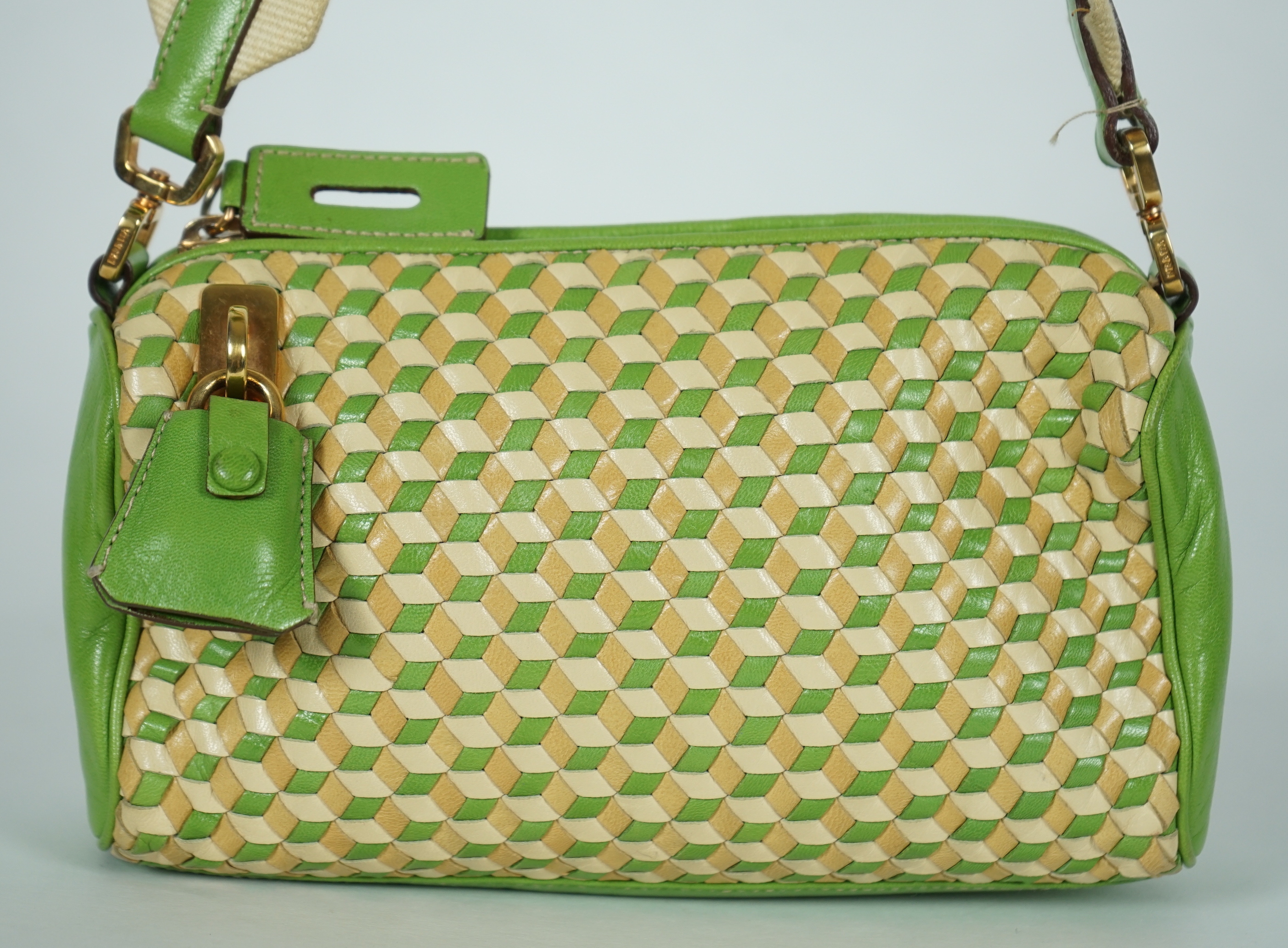 A Prada green and beige leather Intreccio Cube shoulder bag, width 20cm, height 13cm, depth 5.5cm